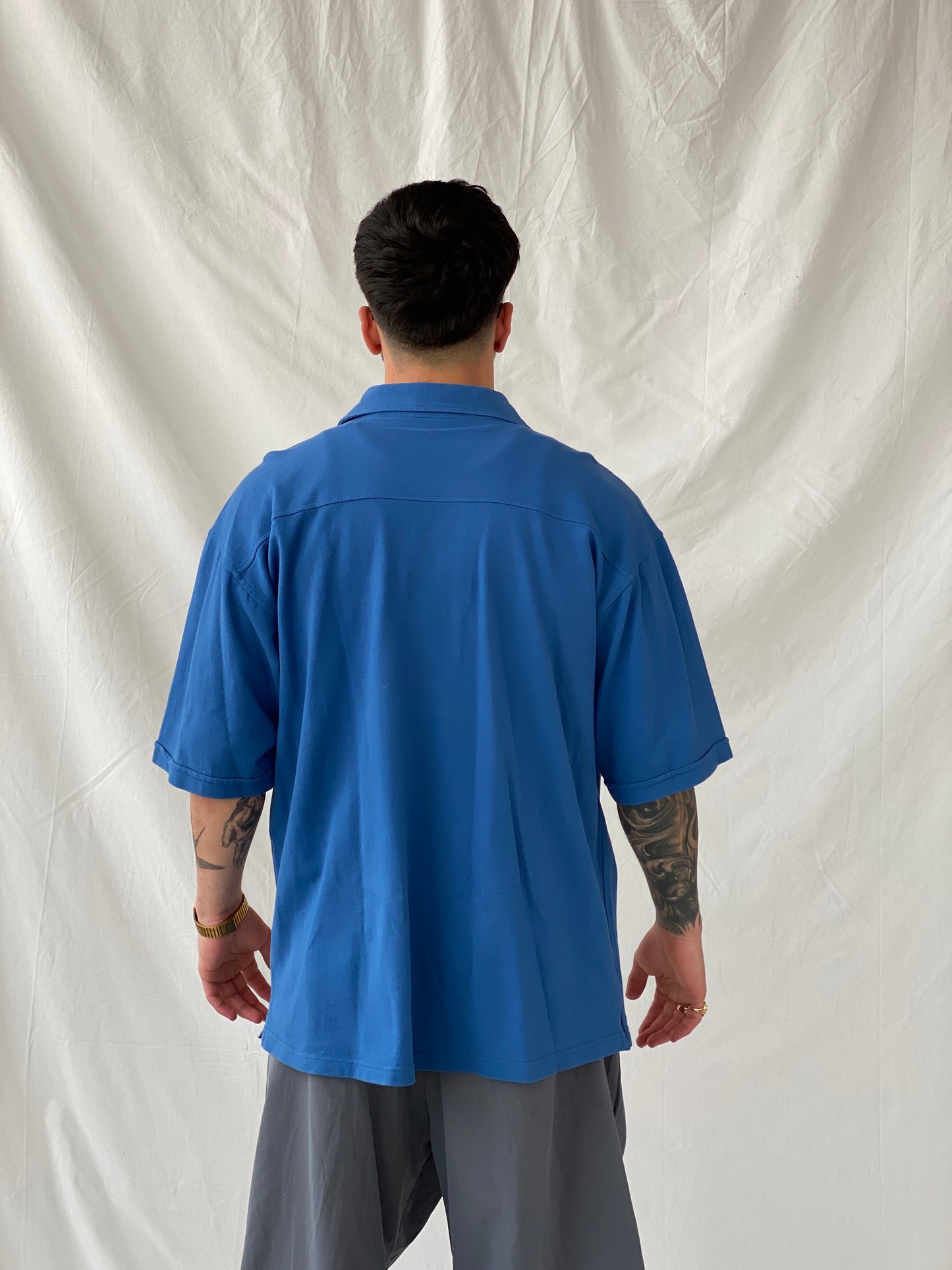 قميص جولف رجالي مخطط أزرق بياقة بولو - مقاس XL