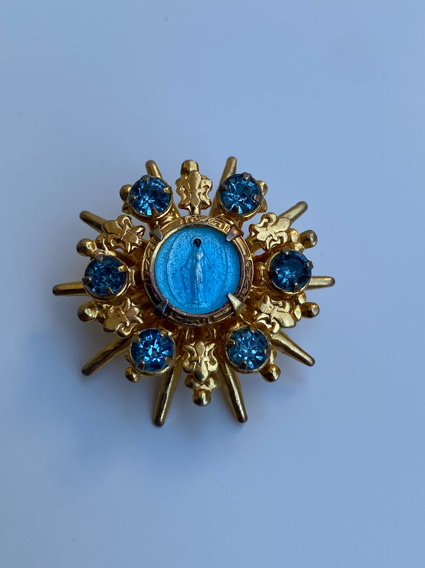 Vintage Mid-Century Gold Tone Blue Rhinestone Miraculous Medal Virgin Mary Starburst Brooch