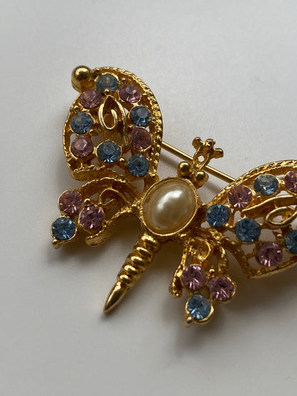 Vintage 80s–90s Olia Gold Filigree Butterfly Brooch with Pink & Blue Rhinestones and Pearl Centre
