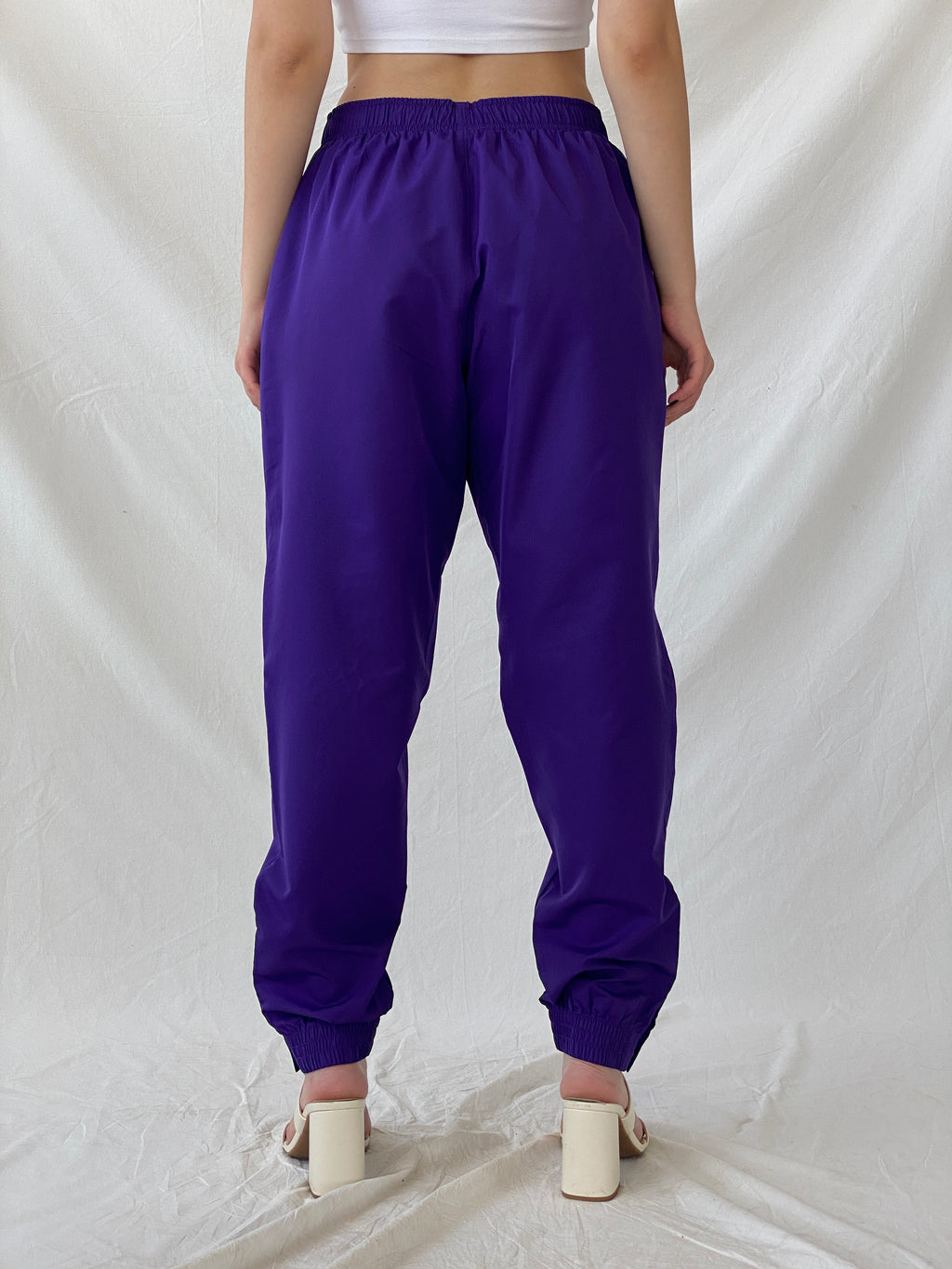 بنطال رياضي نسائي من Asics Purple Windbreaker Sports Wear - مقاس كبير