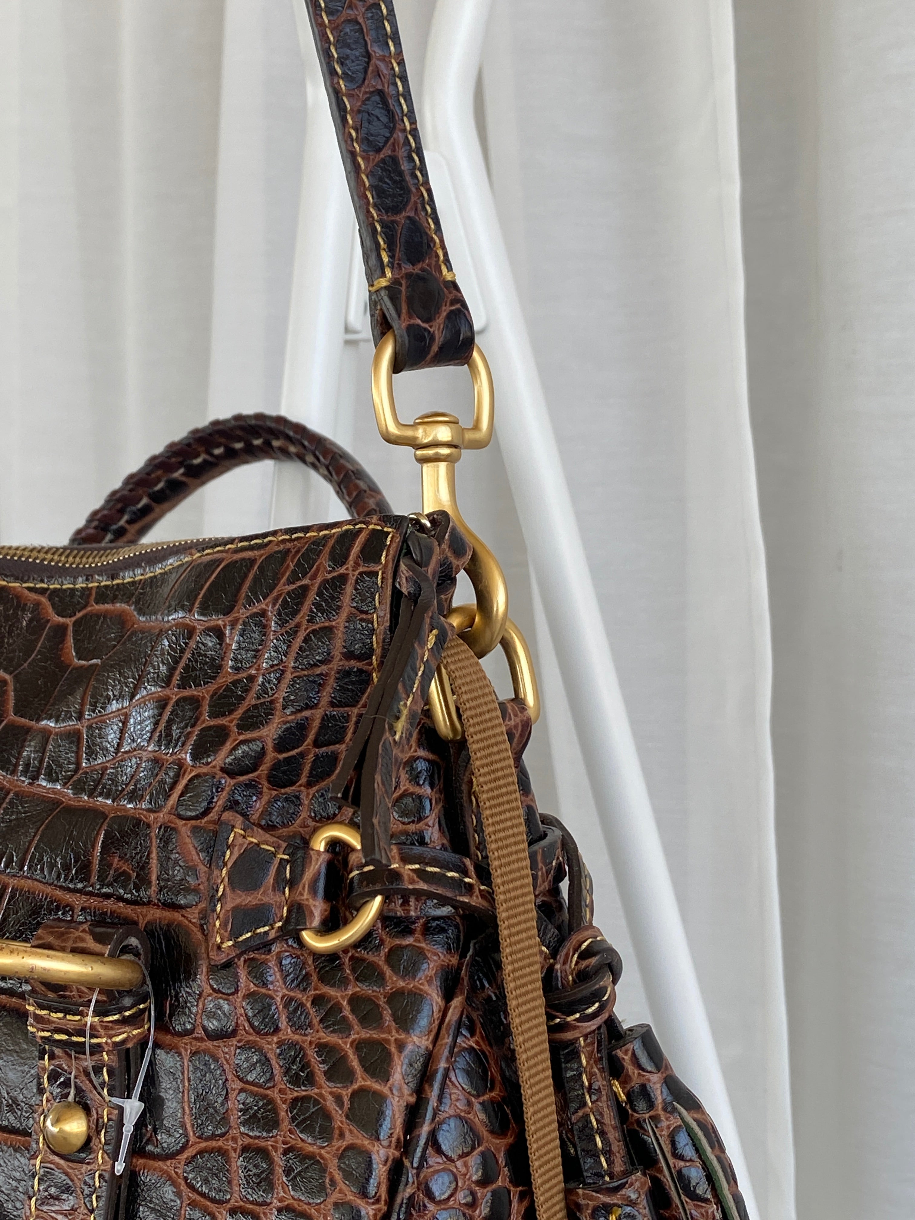 Dooney & Bourke Brown Croc Print Designer Hand Bag with Side Tassels and Gold Details