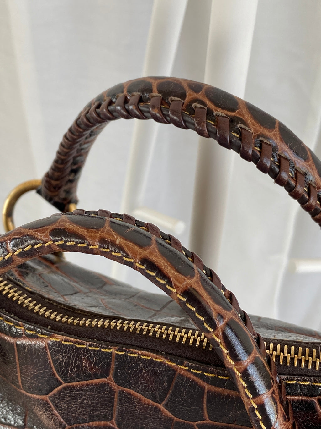 Dooney & Bourke Brown Croc Print Designer Hand Bag with Side Tassels and Gold Details