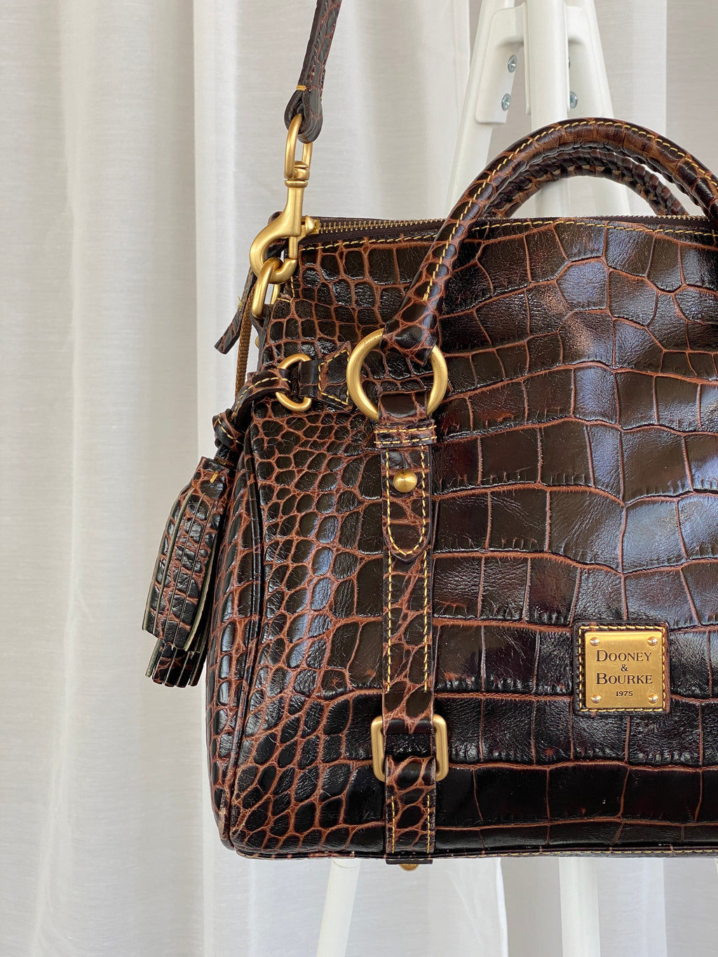 Dooney & Bourke Brown Croc Print Designer Hand Bag with Side Tassels and Gold Details