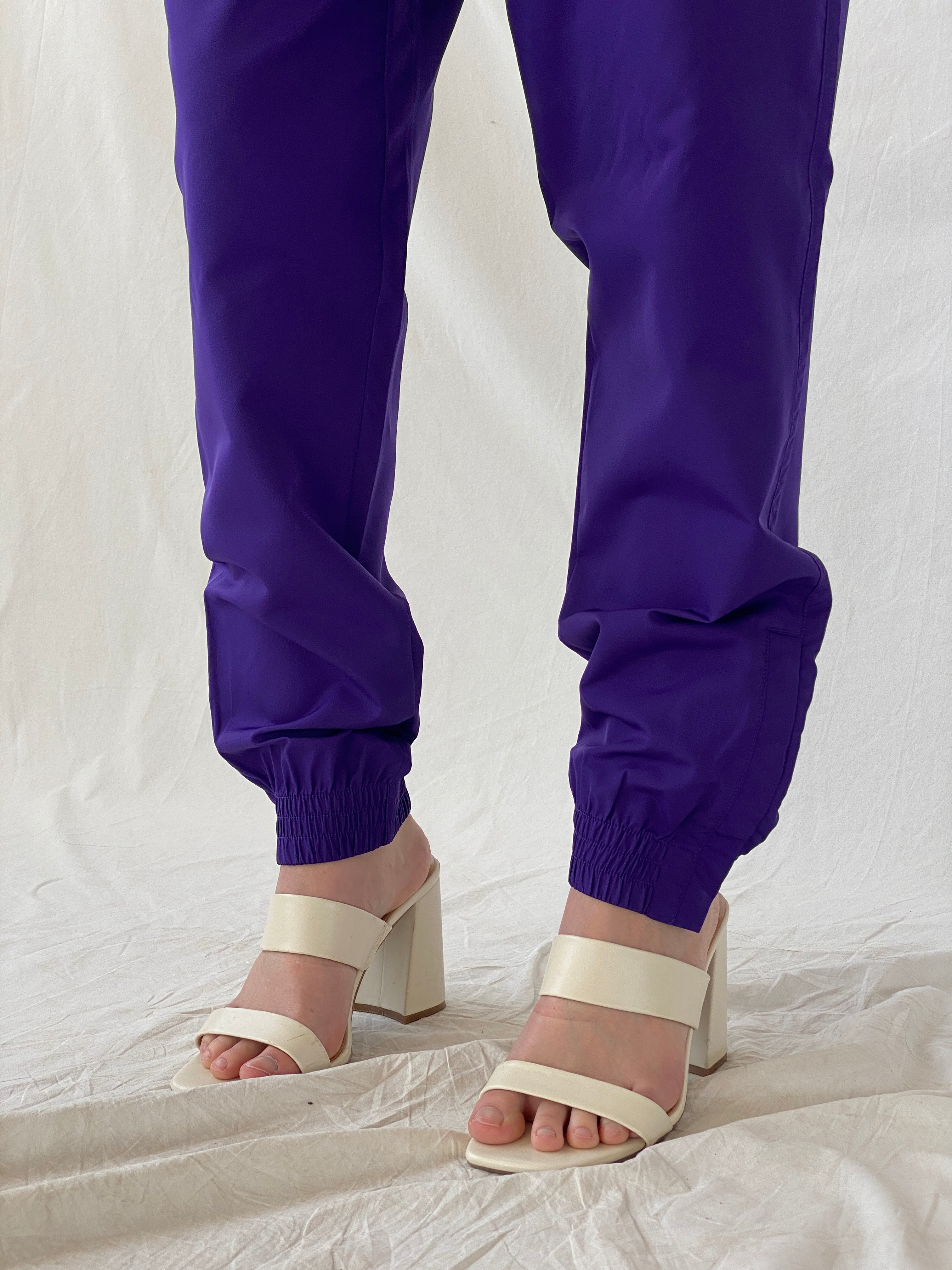 بنطال رياضي نسائي من Asics Purple Windbreaker Sports Wear - مقاس كبير