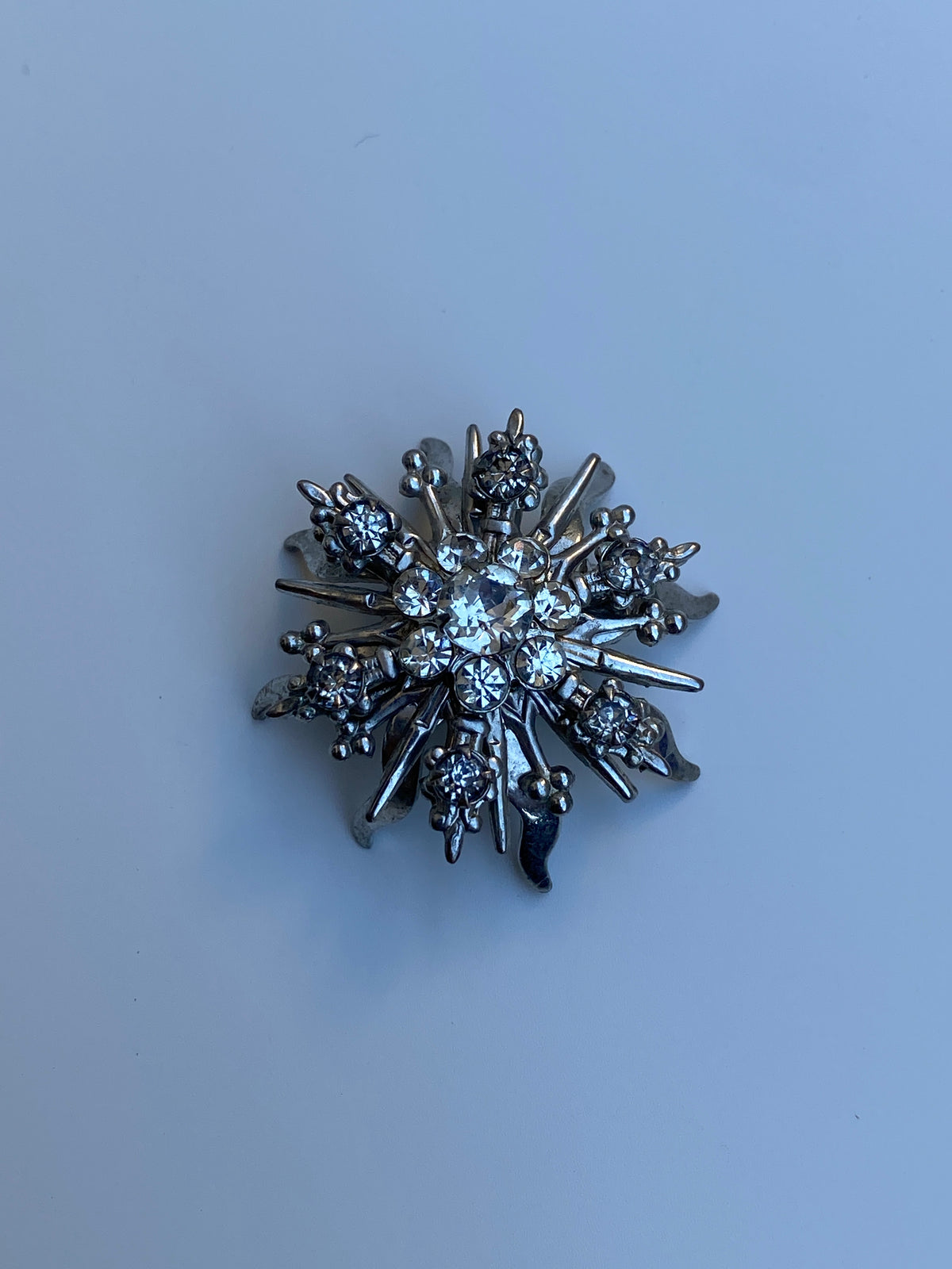 Vintage Mid-Century Silver Tone Rhinestone Starburst Floral Brooch Vintage Mid-Century Silver Tone Rhinestone Starburst Floral Brooch