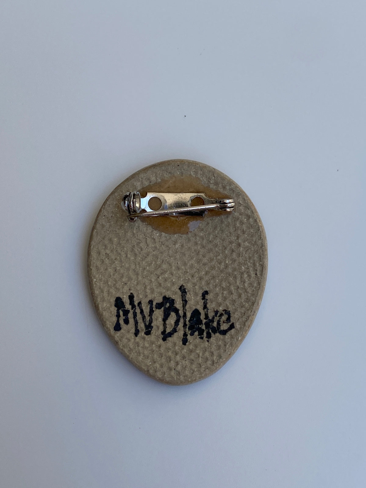 Vintage Hand-Painted Ceramic Tribal Face Brooch by MV Blake Vintage Hand-Painted Ceramic Tribal Face Brooch by MV Blake