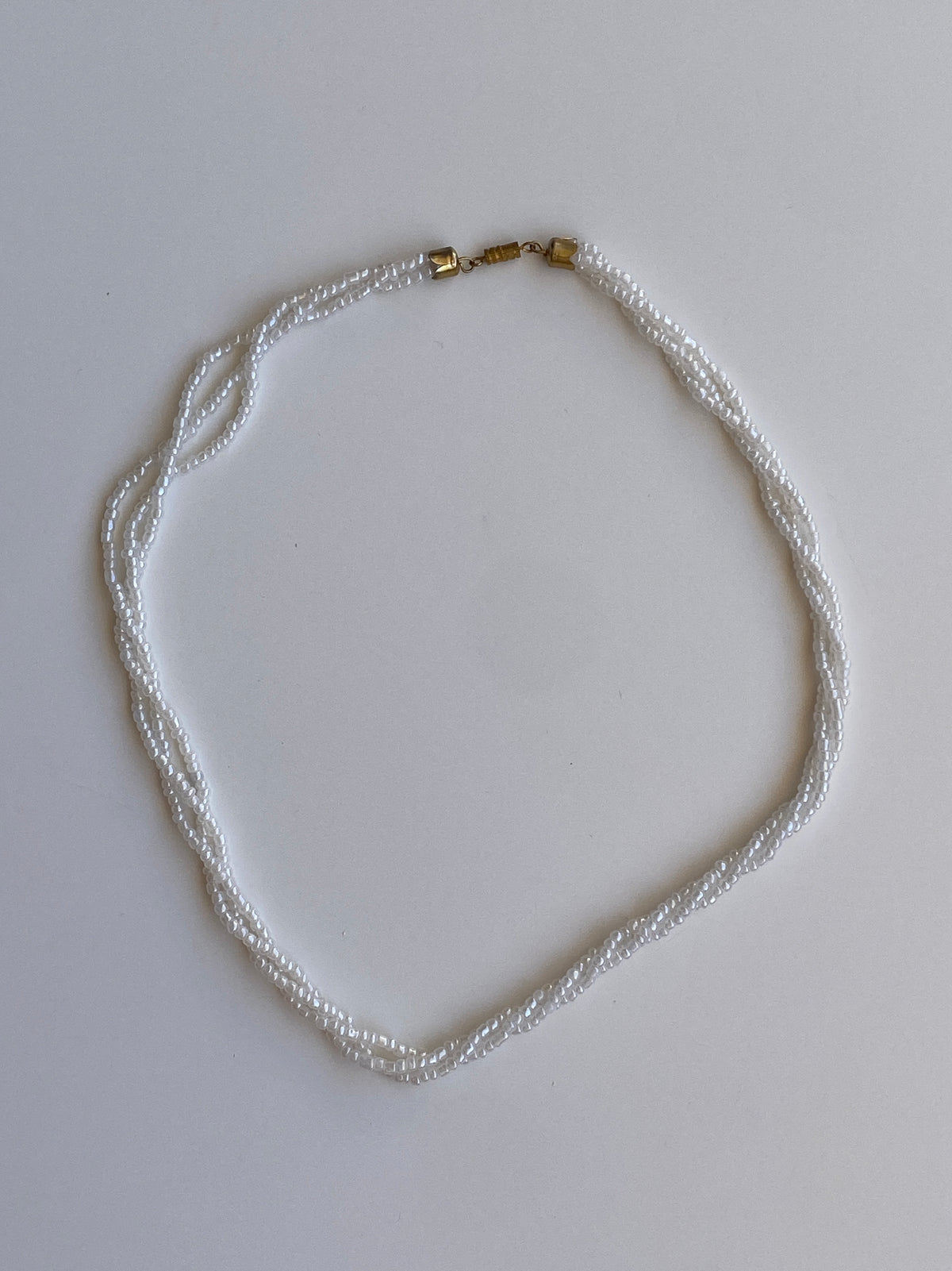 Vintage 90s/Y2K White Iridescent Seed Bead Triple-Strand Necklace with Gold-Tone Clasp