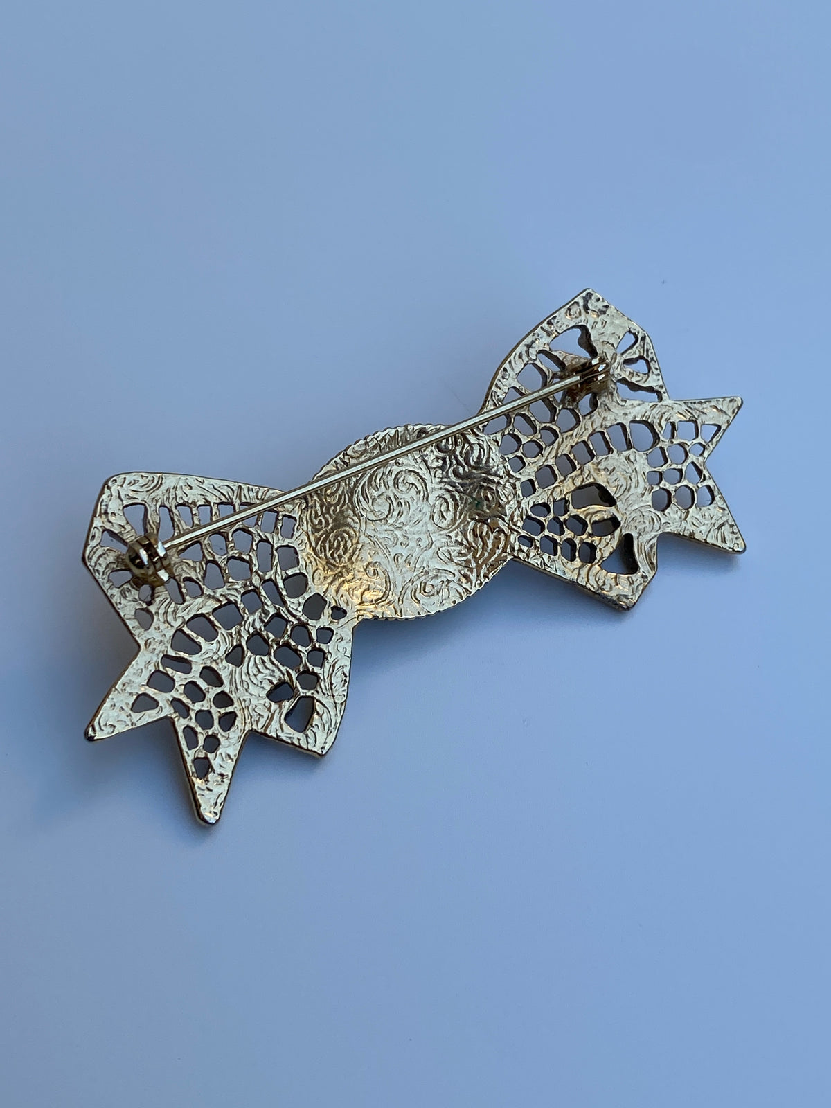 Vintage Victorian Revival Gold Tone Filigree Bow Brooch with Floral Cabochon Vintage Victorian Revival Gold Tone Filigree Bow Brooch with Floral Cabochon