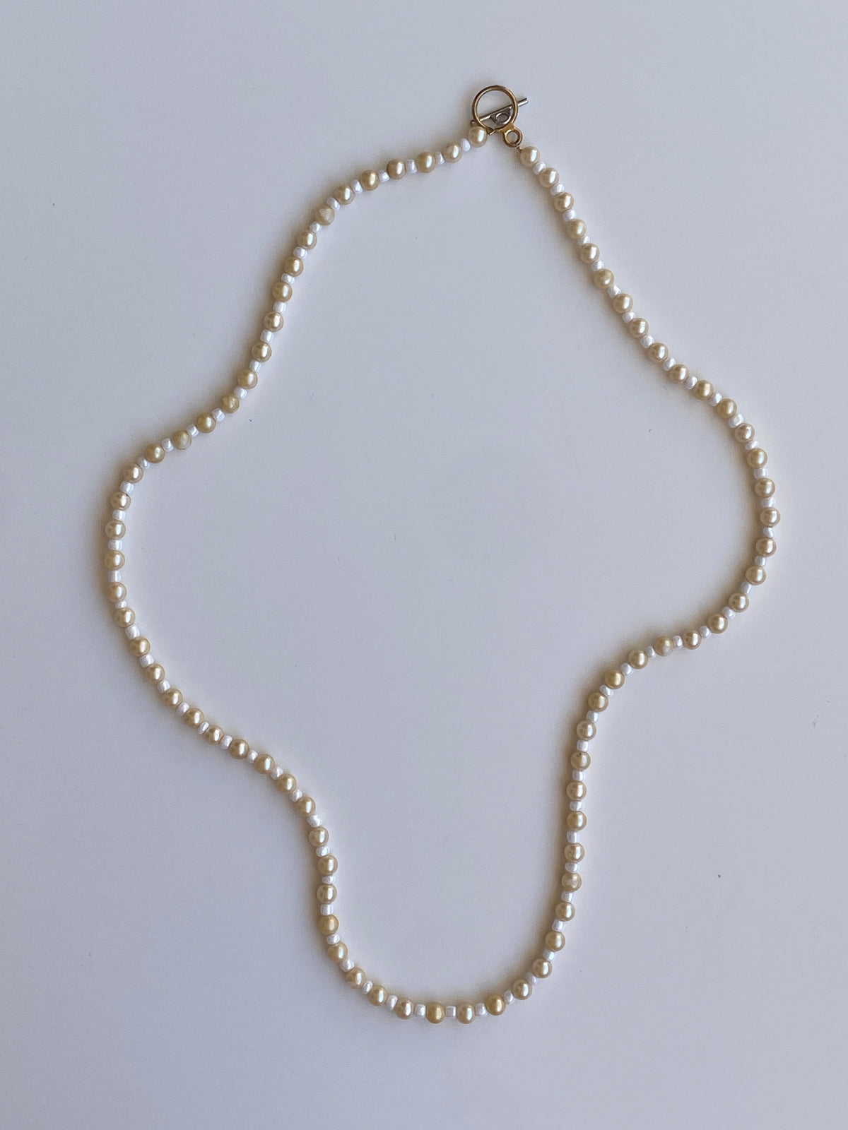 Vintage Y2K Cream & White Faux Pearl Long Strand Necklace with Gold-Tone Toggle Clasp