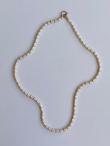 Vintage Y2K Cream & White Faux Pearl Long Strand Necklace with Gold-Tone Toggle Clasp