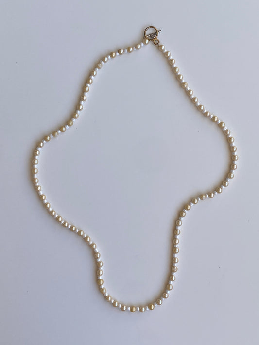 Vintage Y2K Cream & White Faux Pearl Long Strand Necklace with Gold-Tone Toggle Clasp
