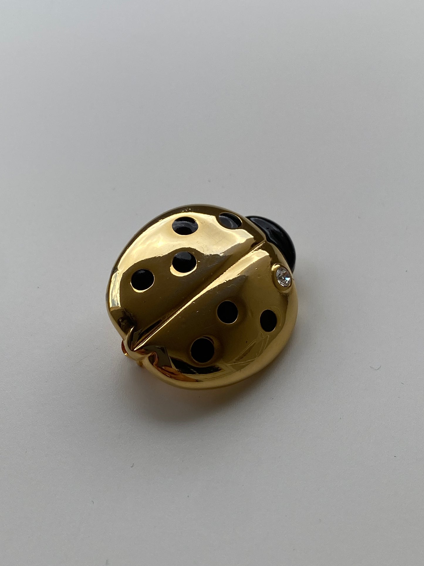 Vintage 80s–90s Gold Tone Black Enamel Ladybug Brooch with Crystal Accent