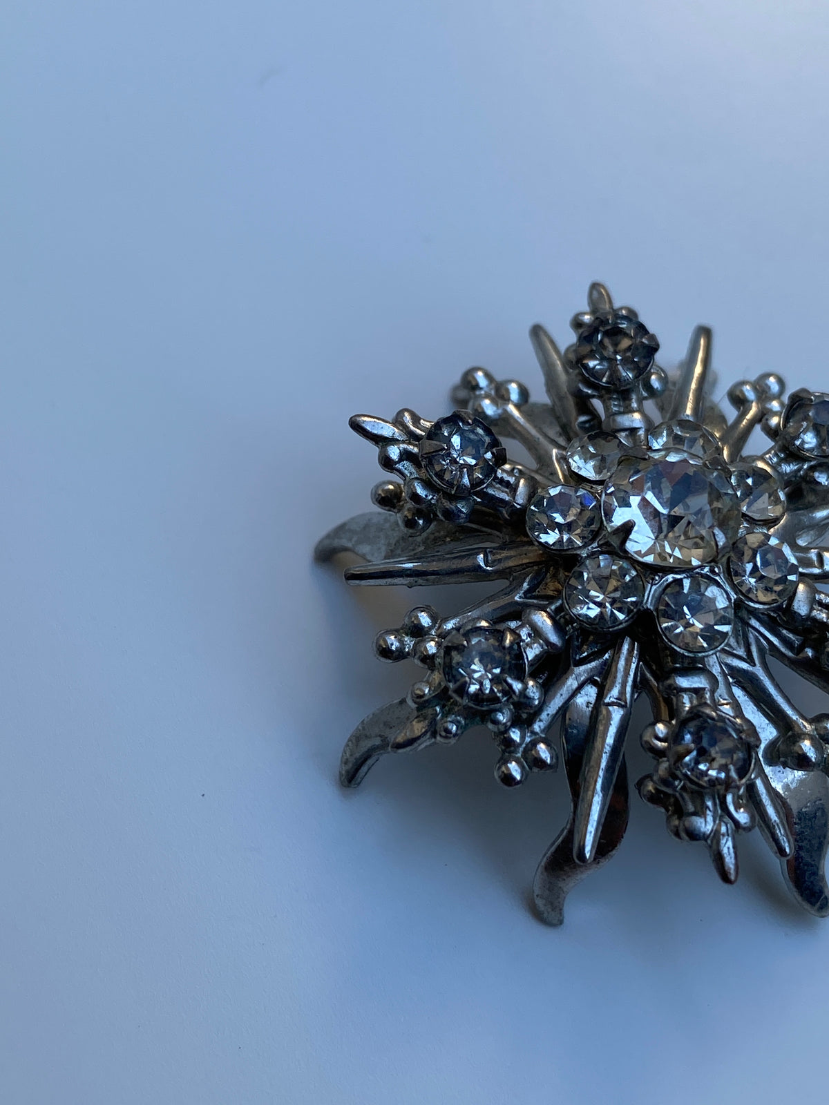 Vintage Mid-Century Silver Tone Rhinestone Starburst Floral Brooch Vintage Mid-Century Silver Tone Rhinestone Starburst Floral Brooch