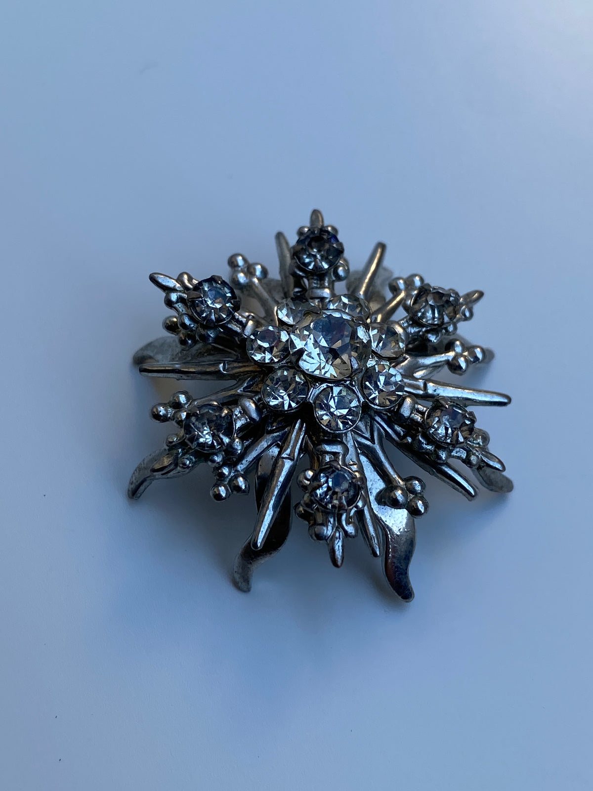 Vintage Mid-Century Silver Tone Rhinestone Starburst Floral Brooch Vintage Mid-Century Silver Tone Rhinestone Starburst Floral Brooch