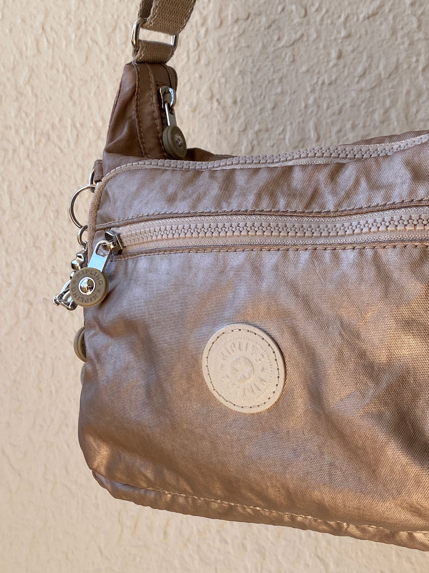 Y2K Kipling Metallic Taupe Nylon Multi-Pocket Crossbody Bag with Monkey Charm