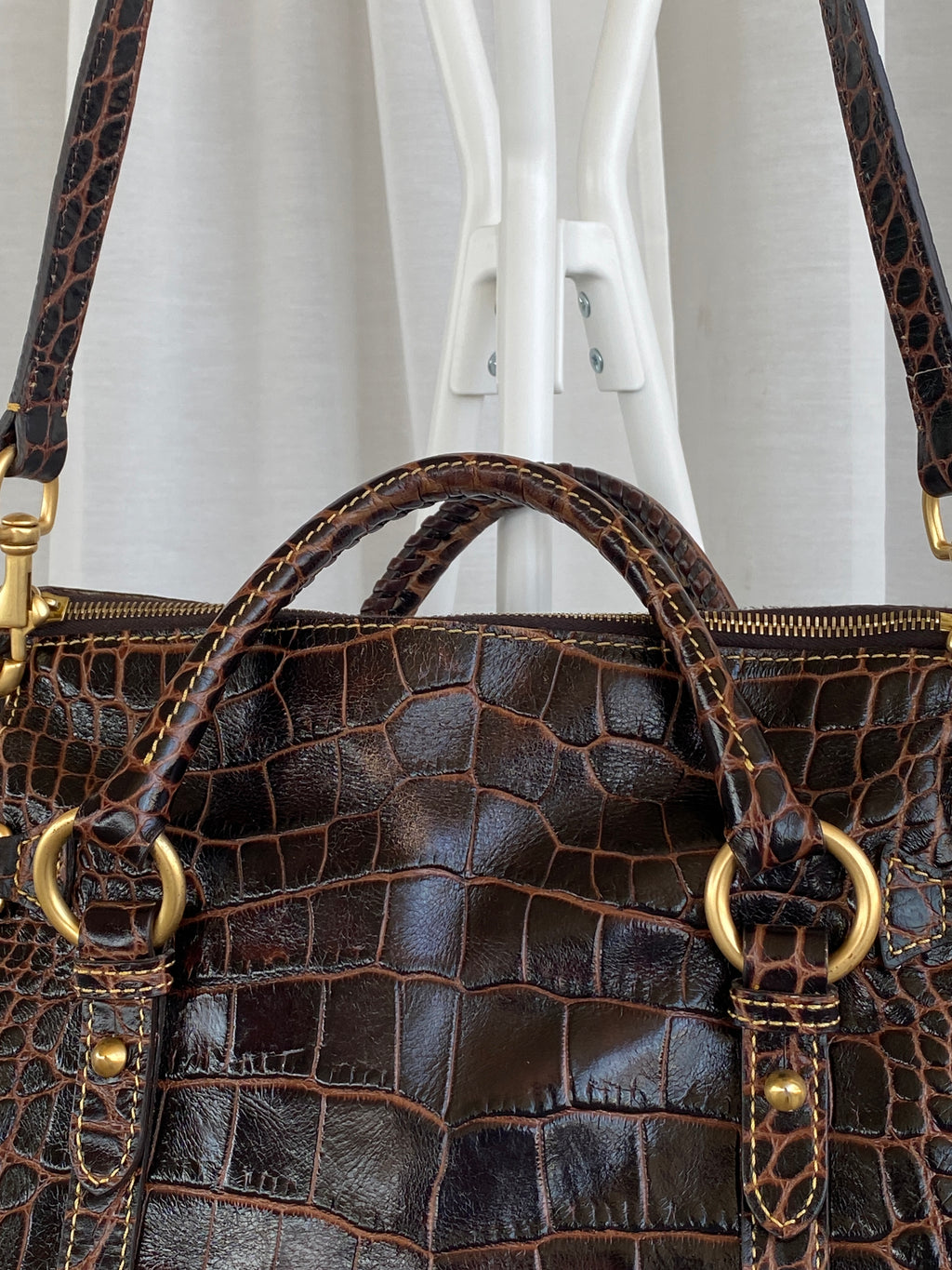 Dooney & Bourke Brown Croc Print Designer Hand Bag with Side Tassels and Gold Details