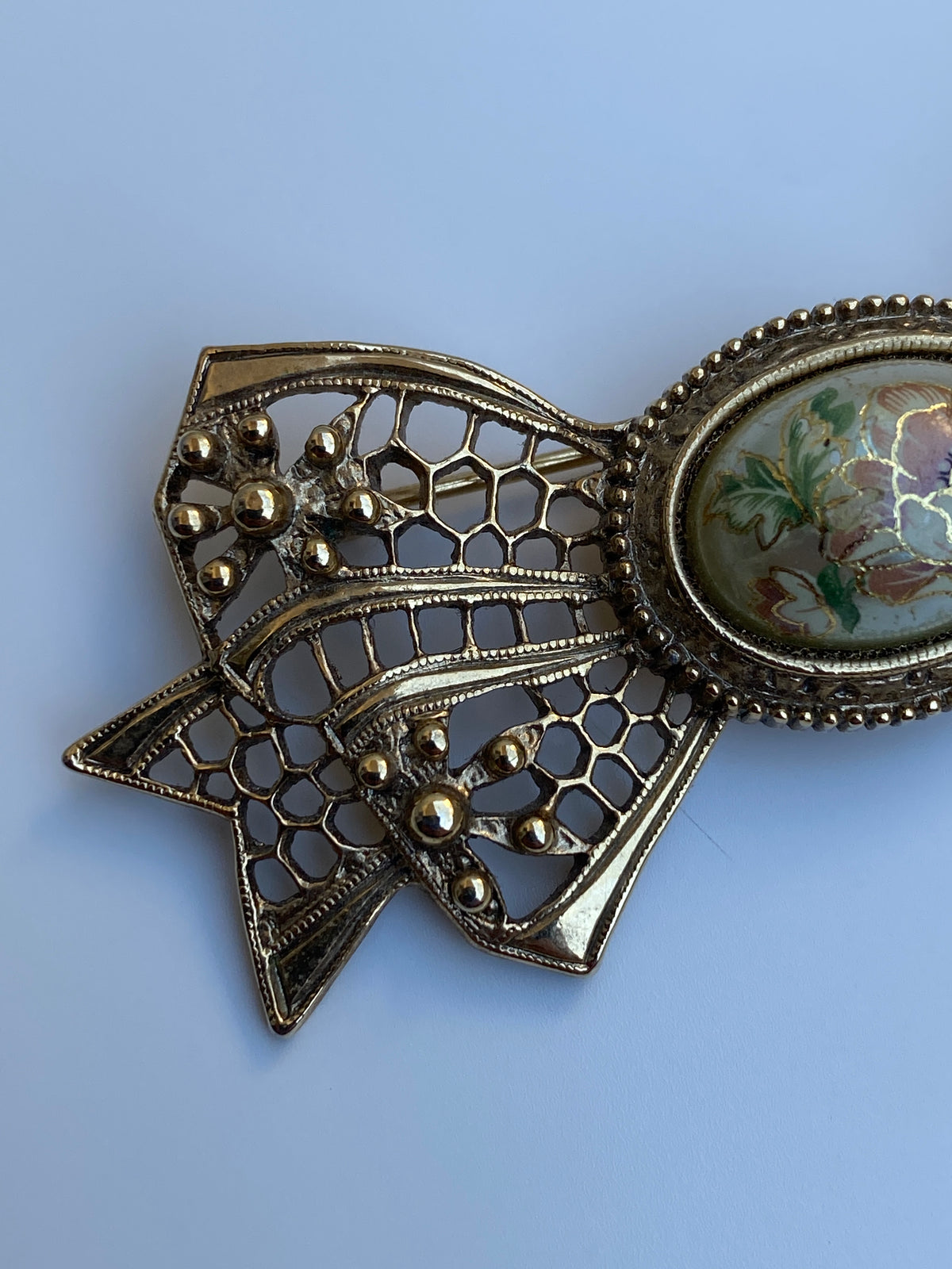 Vintage Victorian Revival Gold Tone Filigree Bow Brooch with Floral Cabochon Vintage Victorian Revival Gold Tone Filigree Bow Brooch with Floral Cabochon