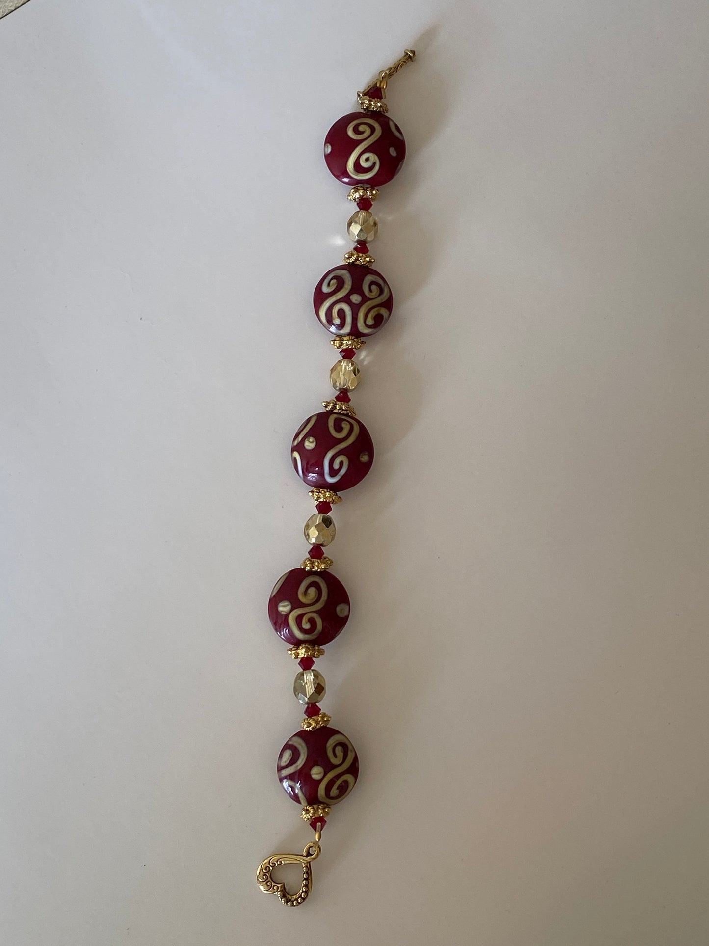 Vintage Lampwork Glass Bead Bracelet Red Swirl Beads with Gold-Tone Toggle Clasp