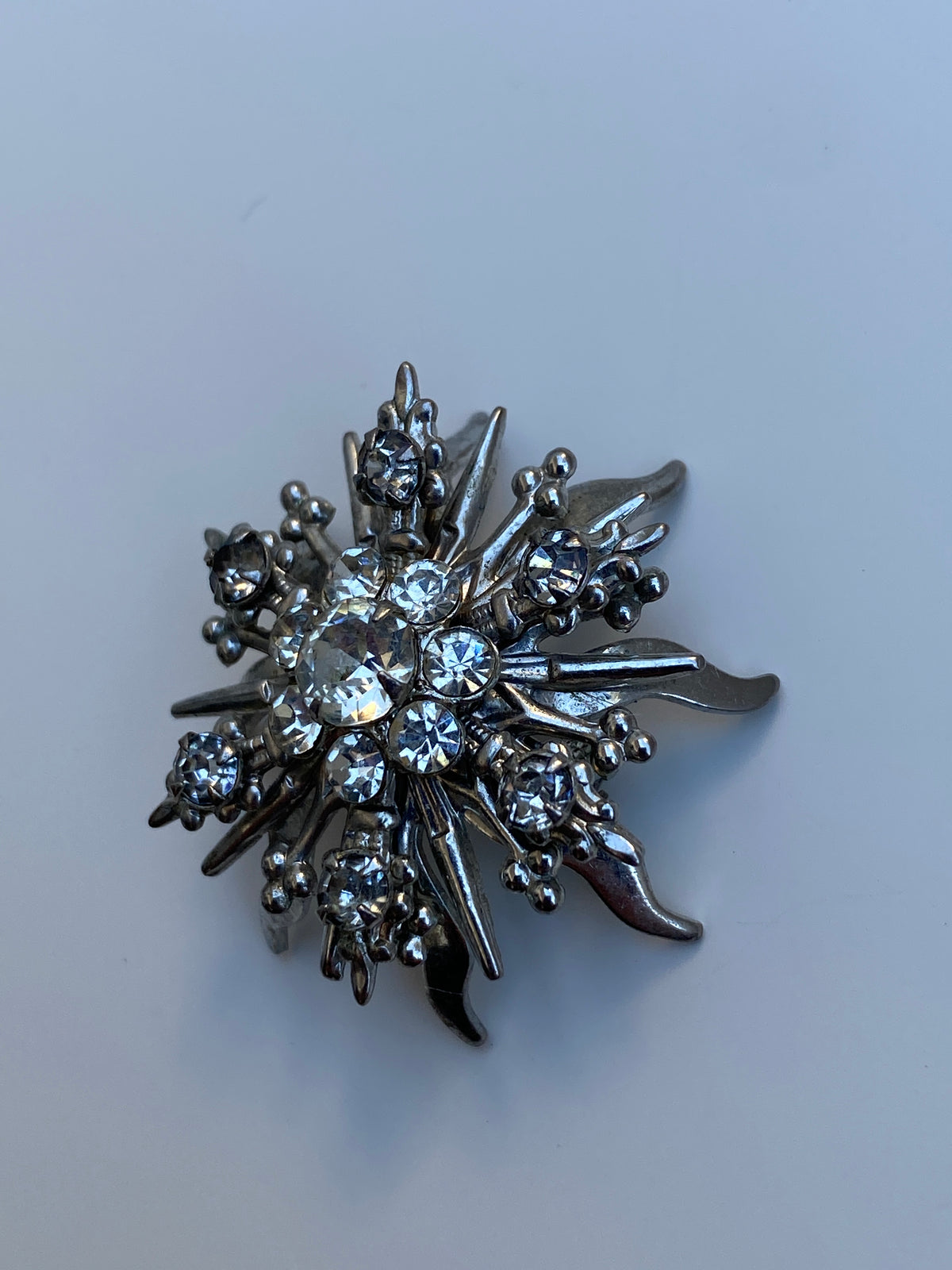 Vintage Mid-Century Silver Tone Rhinestone Starburst Floral Brooch Vintage Mid-Century Silver Tone Rhinestone Starburst Floral Brooch