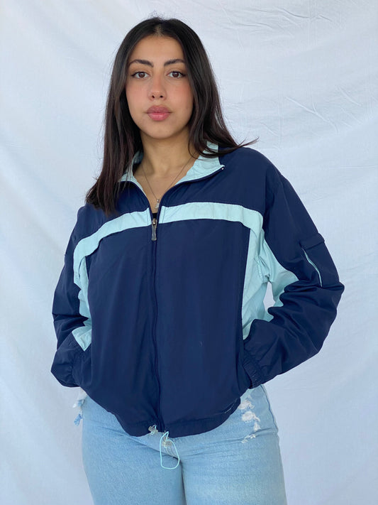 Vintage Reebok Windbreaker Jacket - Balagan Vintage Windbreaker Jacket 90s, nylon, outerwear, Reebok, vintage, windbreaker, windbreaker jacket